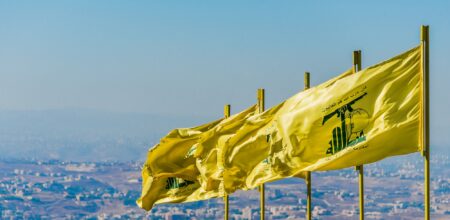 Hezbollah flags fly over southern Lebanese land