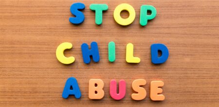 Stop child abuse colorful words (iStock/Sohel_Parvez_Haque)