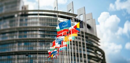 Flags in front of the European Parliament (iStock/AdrianHancu)