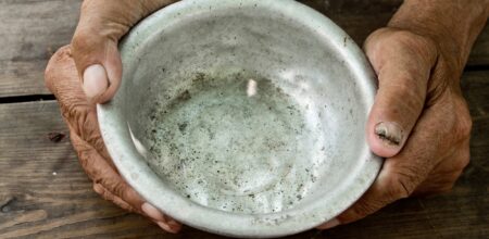 An empty bowl for begging (iStock/Stas_V)